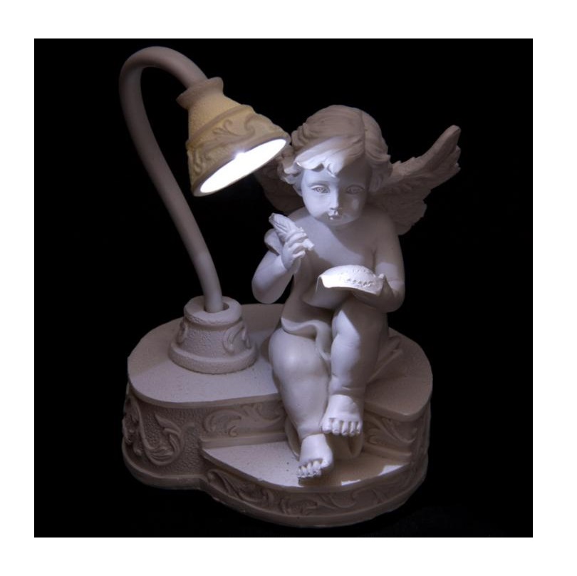 Lampe Ange chrubin lisant sous une lampe