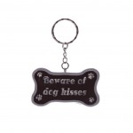 Porte-cl�s en forme d'os Beware of dog kisses 6 cm gris
